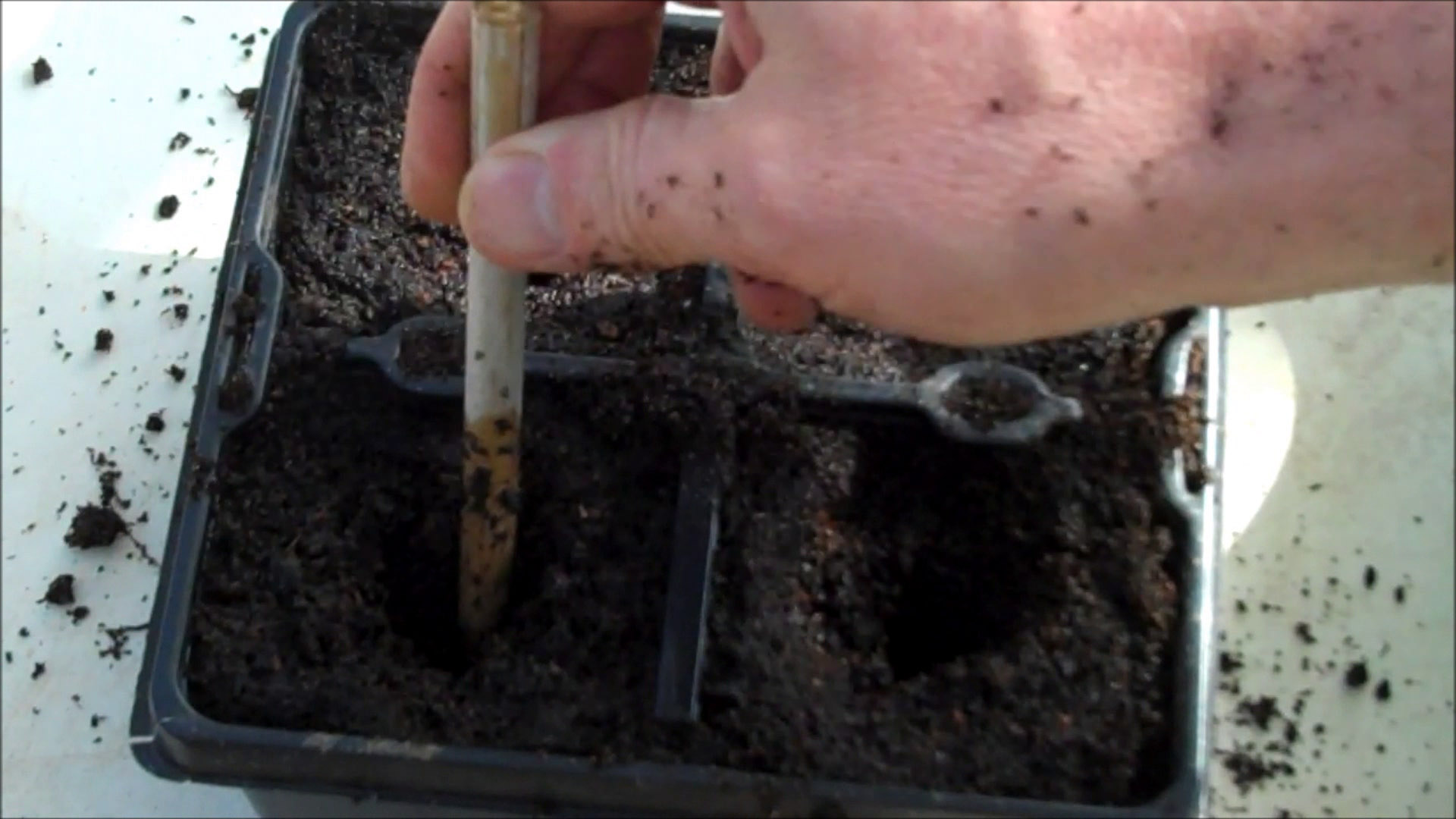 make a hole in compost compost